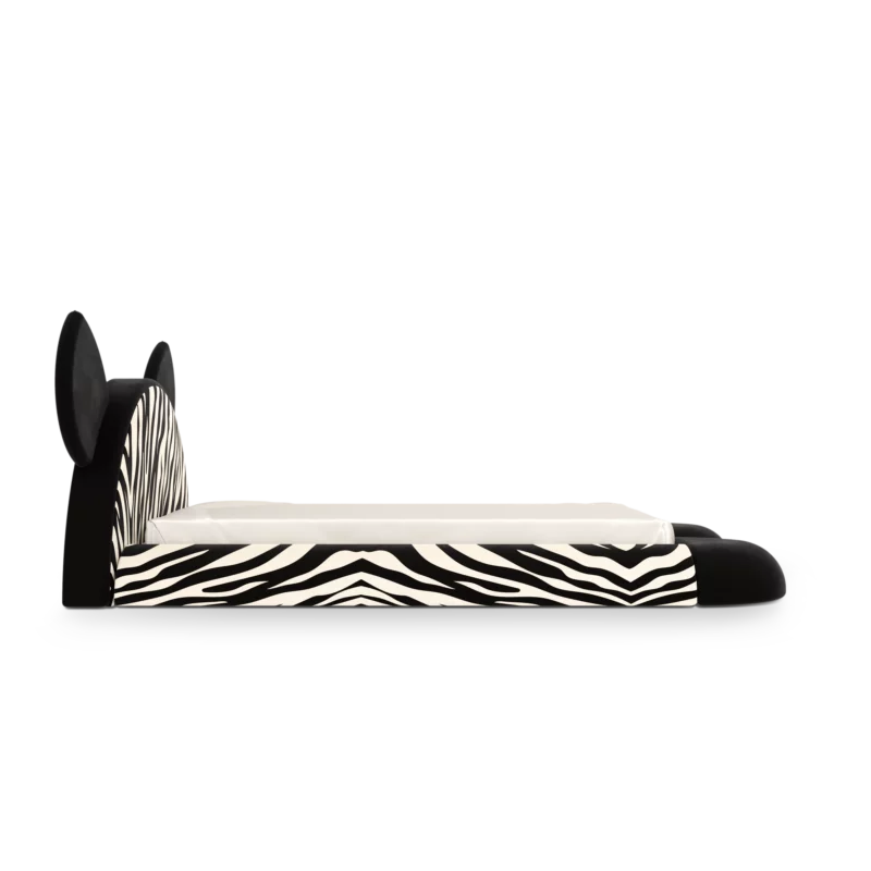 Zebra kids bed with animal ears and striped fabric